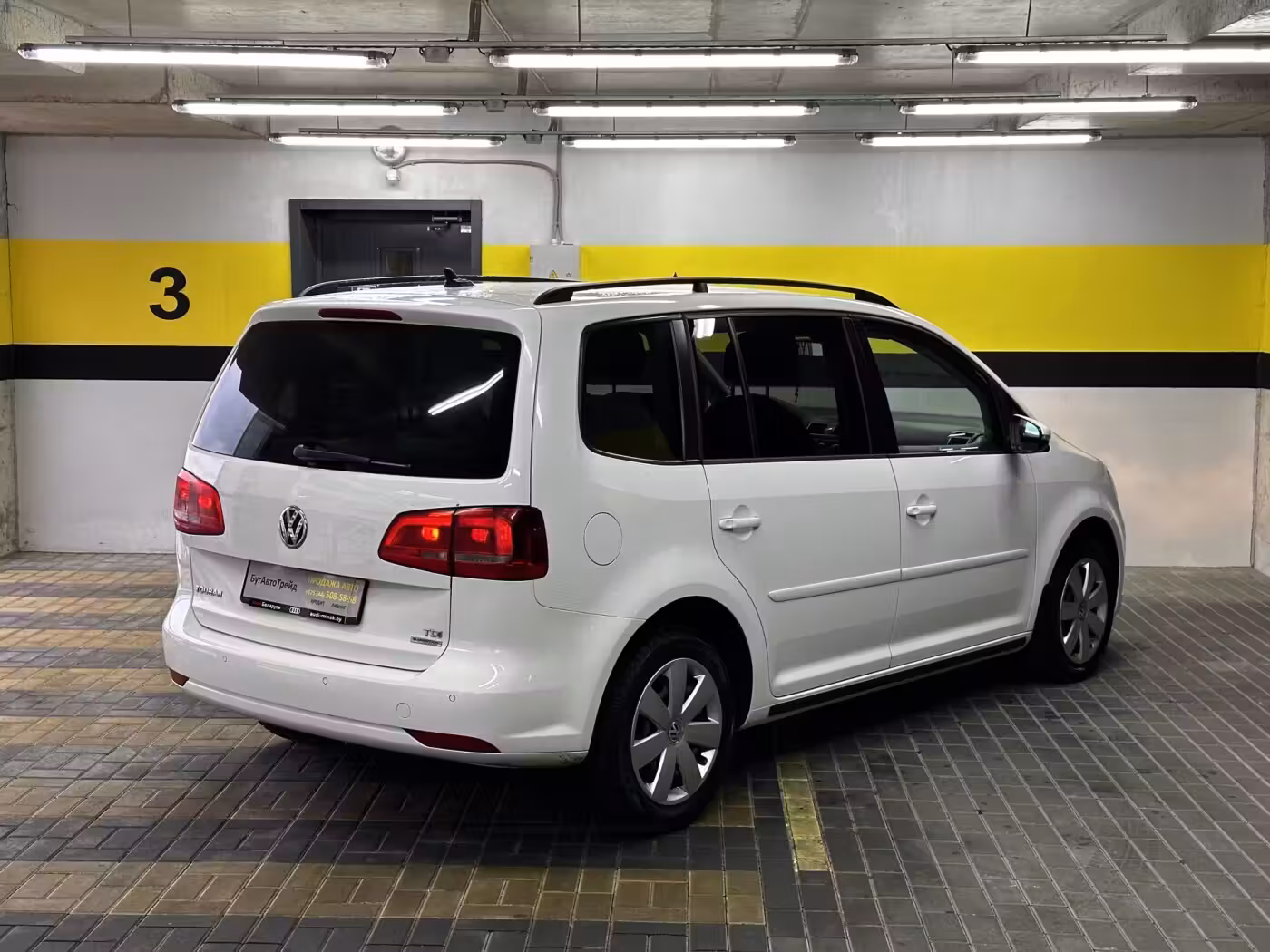 Volkswagen Touran фото 7